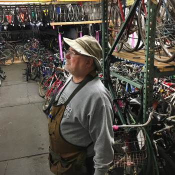 R Community Bikes founder Dan Lill in their Rochester warehouse