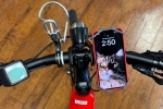 Image of a smartphone holder mounted to a bicycle handlebar.