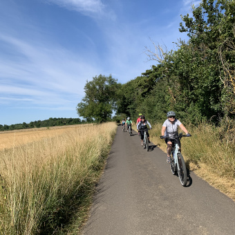 Cotswolds cyclists on path vertical