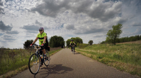 two cyclist on bike path Minnesota Lake Wobegon Trail Bike Tour