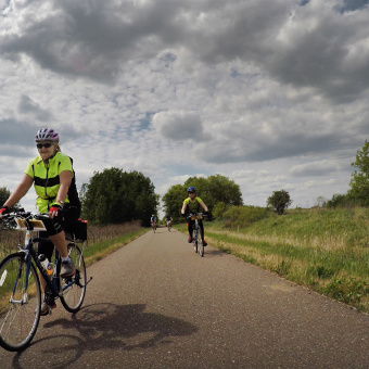 two cyclist on bike path Minnesota Lake Wobegon Trail Bike Tour