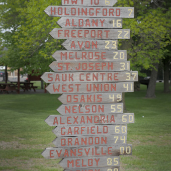 Mileage sign Minnesota Lake Wobegon Trail Bike Tour