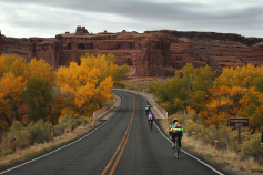 Cliff and bike path view Moab Arches and Canyonlands Bike Tour