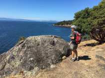 Cyclist enjoying the view Washington San Juan Islands Bike Tour