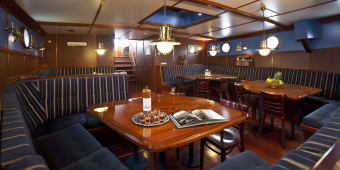 Dining room on the Wapen fan Fryslân sailboat in the Netherlands