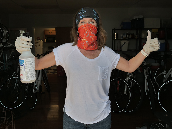 Bike our specialist Michelle Cooley is armed with sanitizer