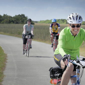 Three cyclist on the bike path during Florida Everglades and the Keys Bike Tour