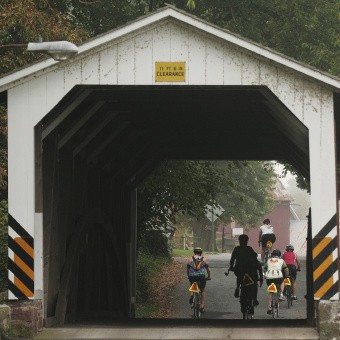 Cyclist going through tunnel Pennsylvania Dutch Country Bike Tour
