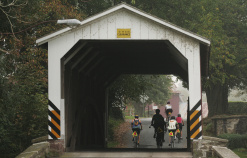 Cyclist going through tunnel Pennsylvania Dutch Country Bike Tour