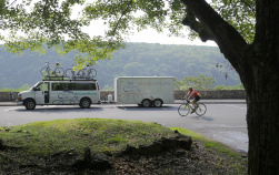 Woman tours van and cyclist Epic Bike Tour