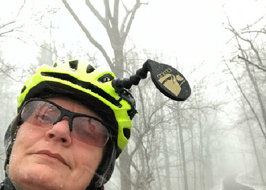 woman bike riding in the winter