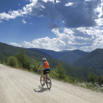 Cyclist along bike path Idaho Greenways Bike Tour