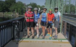 Cyclist on state lines Epic Bike Tour