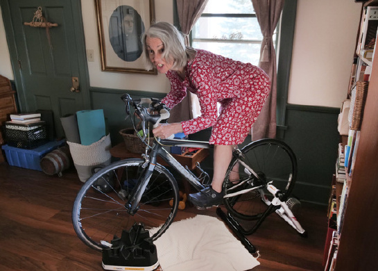 Karen Miltner on her bike indoors