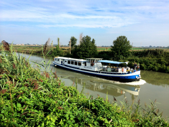 Barge in river during Italy Bike and Barge Bike Tour