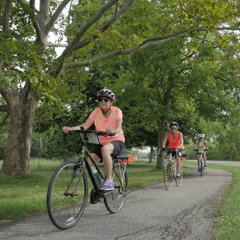 Cyclist along bike path Niagara Falls Pathways