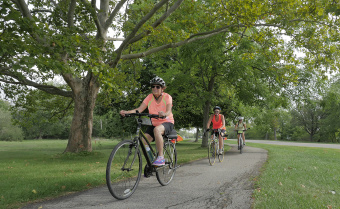 Cyclist along bike path Niagara Falls Pathways