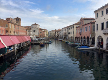 Canal way in town during Italy Bike and Barge Bike Tour