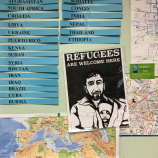 Bulletin board with names and refugees sign R Community Bikes