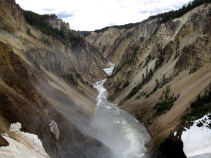 River in between mountains Yellowstone and Grand Teton National Parks Bike Tour