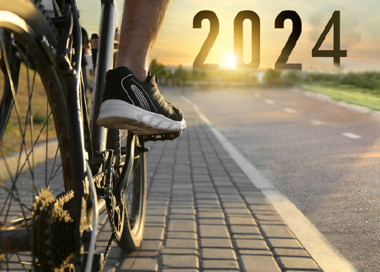 cyclist on a road with 2024