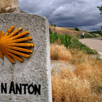 rock and a shell sign Spain Camino de Santiago bike tour