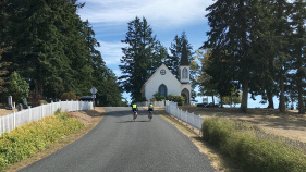 Cyclist on bike road Washington San Juan Islands Bike Tour