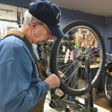 fixing bike wheel R Community Bikes